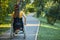 Disabled girl enjoying fresh air in the park