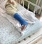 Disabled Injured Person With Sprained or Broken Ankle or Foot. patient be in plaster cast or splint in hospital lying on patient