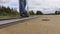 Disabled man with crutches on the railroad crossroads