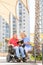 Disabled man with his wife fiilng happy while reading holy bible