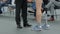 Disabled man with leg prosthesis walking in front of the jury at competition