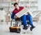 Disabled man repairing chair in workshop