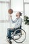 Disabled man spinning basketball ball