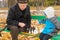 Disabled man teaching his grandson to play chess