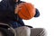 Disabled man throwing basketball