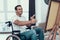 Disabled Man in Wheelchair Painting Picture