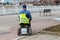 Disabled person in an electric wheelchair on the street