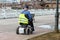 Disabled person in an electric wheelchair on the street