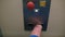 Disabled person presses an elevator button with a stump.