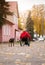 Disabled person in a wheelchair with a guide dog