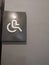 Disabled toilet sign symbol on the wall