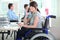 Disabled woman in office