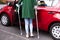 Disabled Woman Opening Door Of A Car