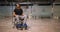 Disabled young man in wheelchair on an airport.