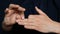 Disappearing finger phalanx. Man is doing a trick with hands. Showing a magic trick