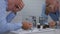 Disappointed Businessman Image in Bathroom with Pills and Drugs on the Sink