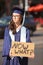 Disappointed Graduate with Sign