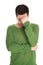 Disappointed student with green pullover isolated on white background.