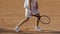 Disappointed tennis player hitting racket against ground, sportsman losing game