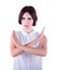 A disappointed woman crossing her hands in protest, isolated on a white background. The decisive young brunette woman.