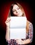 Disappointed young girl holding exercise book