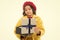 Disappointing purchase. Child stylish hold open gift box. Girl cute little lady coat and beret throws out gift. Spring