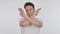 Disapproving Young Man Rejecting by Arm Gesture on White Background