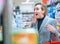 Disbelief. Surprised woman in supermarket