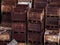 Discarded rusty metal storage boxes stacked