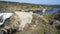 Discharge of a reservoir due to the melting of snow due to the arrival of spring. Atazar, Madrid