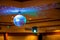Disco ball with bright rays, night party background photo . party lights disco ball .