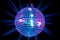 Disco-ball illuminating with blue and purple party lights