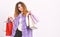 Discount black friday. Shopping and gifts. Girl makeup furry violet vest shopping white background. Woman shopping