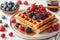 Discover the joy of eating fresh, homemade waffles covered in berries and sparkling sugar, cafe menu