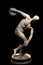Discus thrower ancient marble statue isolated on black
