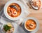 the dish Bouillabaisse with salmon fillet, shrimps on the table close-up