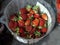 Dish with bright fresh red ripe strawberries