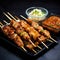 A dish of chicken yakitori kebabs