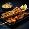 A dish of chicken yakitori kebabs