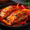 A dish of flaky fish and vibrant peppers, cooked to perfection and arranged on a plate