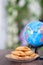 A dish of fried spring rolls and globe in vertical composition