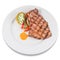 Dish of grilled Iberian pork secreto with baked potatoes