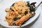 A dish of seafood rice pics, with mussels, clams, shrimp, musse