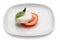 Dish with sliced tomato