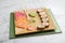 Dish with sushi roles on marble table