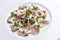 Dish of veal slices with mayonnaise of tuna and capers