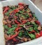 Dish of vegan black beans mushrooms spinach and peppers