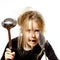 Disheveled preschooler girl with soup ladle