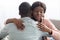 Dishonest black lady hugging her boyfriend or husband