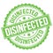 DISINFECTED text on green round stamp sign